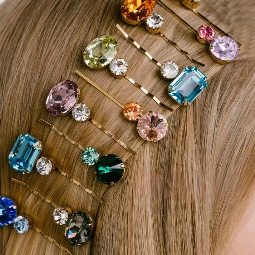 Colorful gemstone hair pins on a person's hair